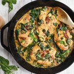 low fodmap creamy tuscan chicken in skillet