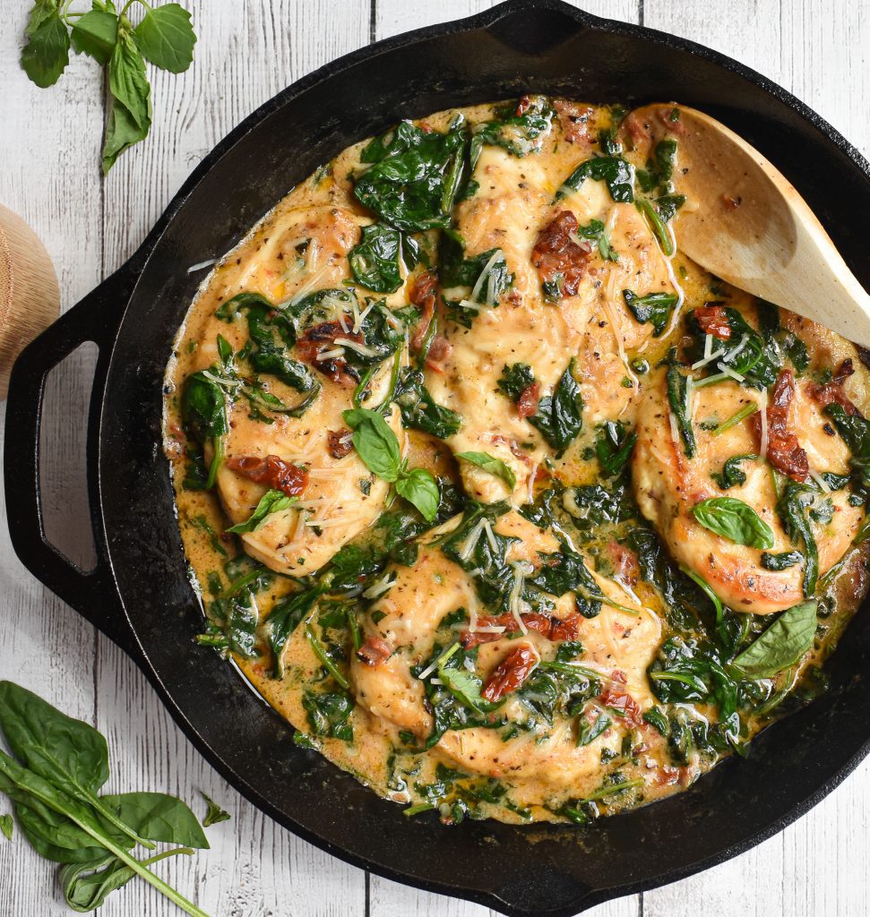 low fodmap creamy tuscan chicken in skillet