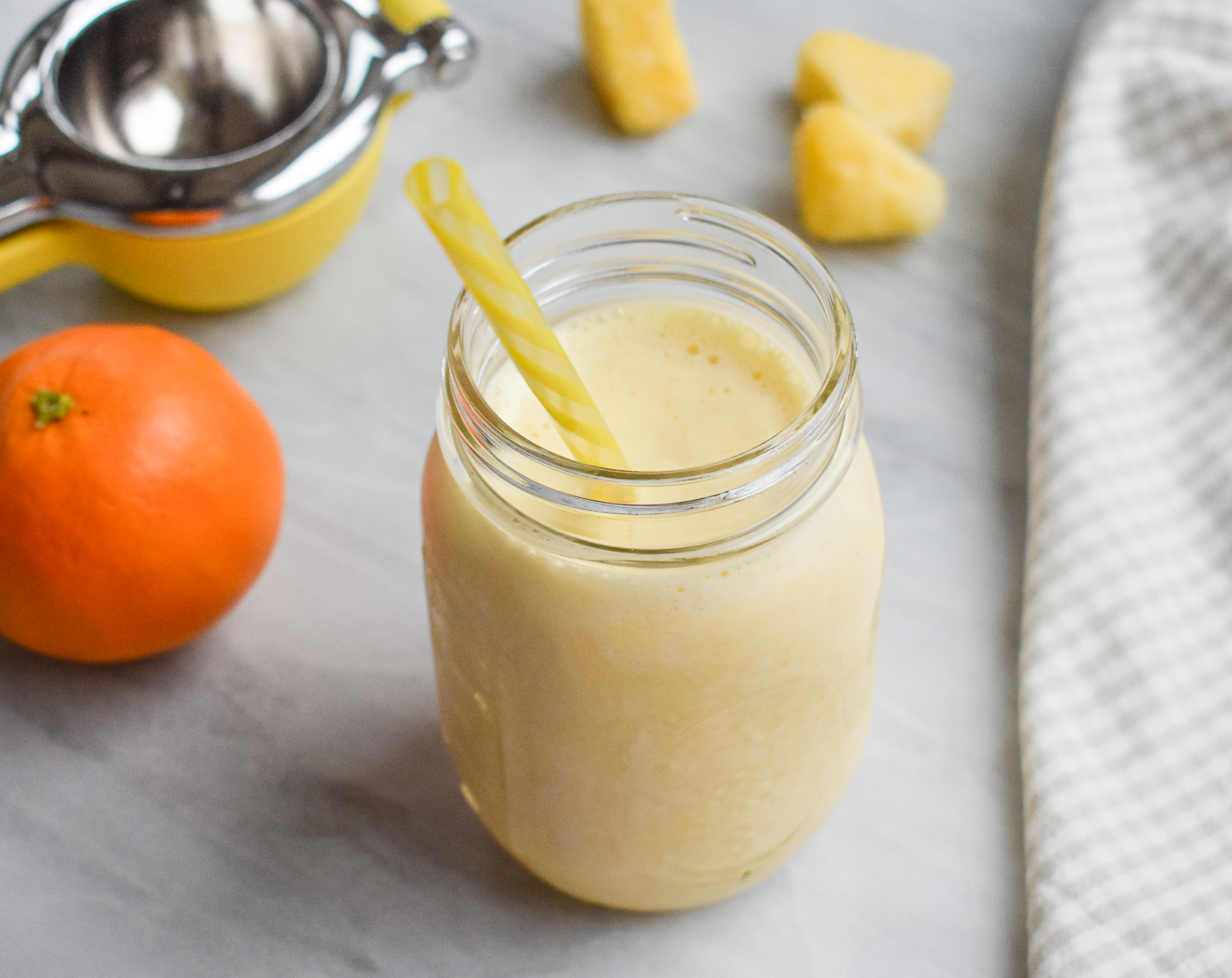 https://www.rachelpaulsfood.com/wp-content/uploads/2023/05/pineapple-orange-smoothie.jpg