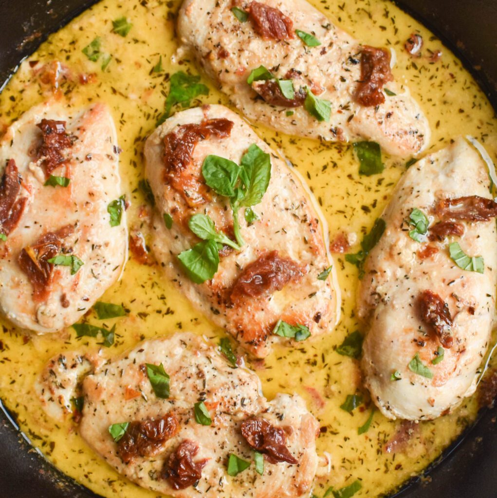 30-minute low-FODMAP 'marry me' chicken in skillet with basil