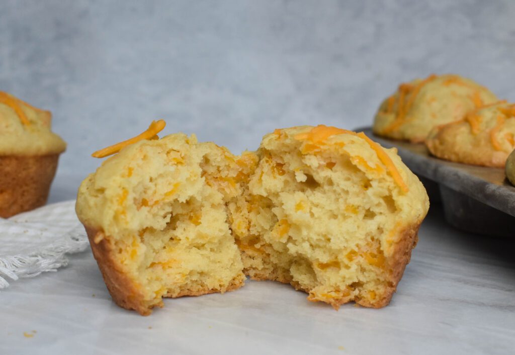 low-FODMAP Cheddar Cheese muffins broken apart