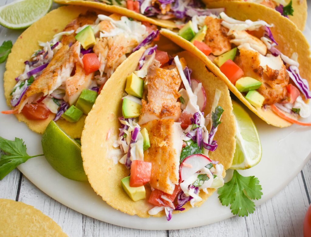 low fodmap fish taco close up on platte