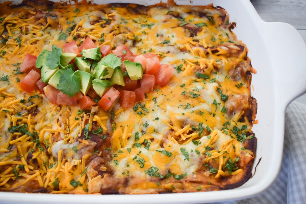low fodmap chicken enchilada from angle in casserole